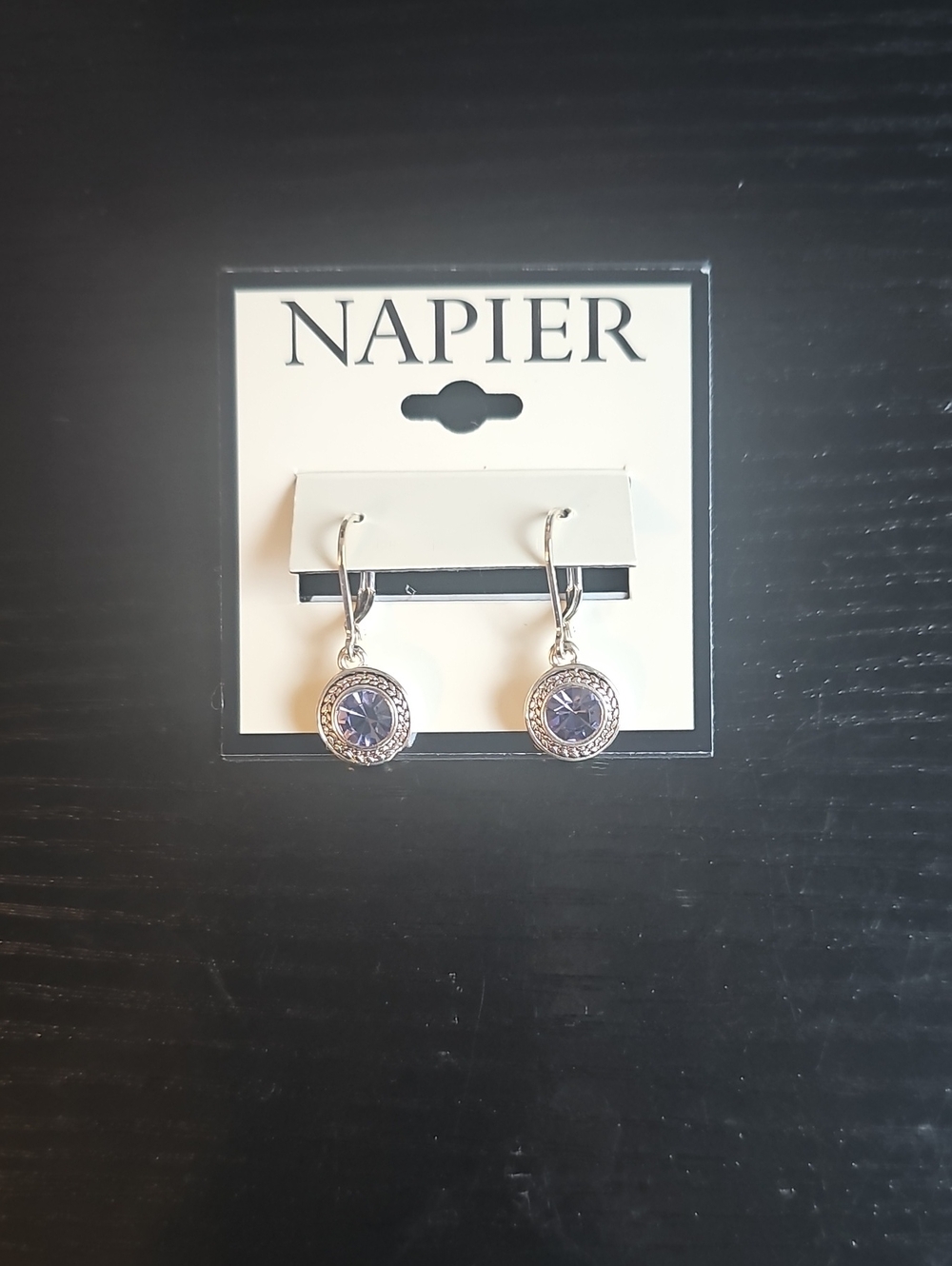 Napier Silver Tone Earrings with Purple Crystal Centers